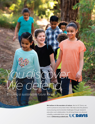 an advertisement showing a group of students on a hike 'You Discover. We defend.