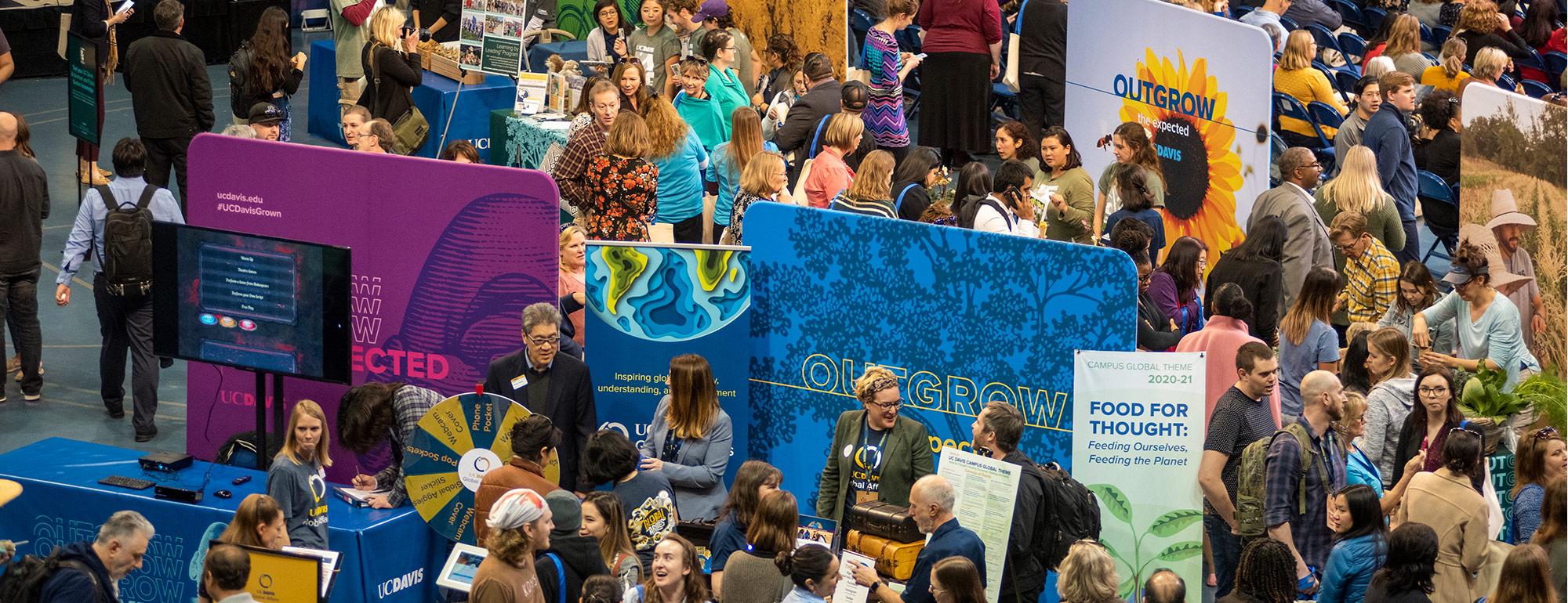 students and staff gathered at the UC Davis rebrand event 'Outgrow the Expected'